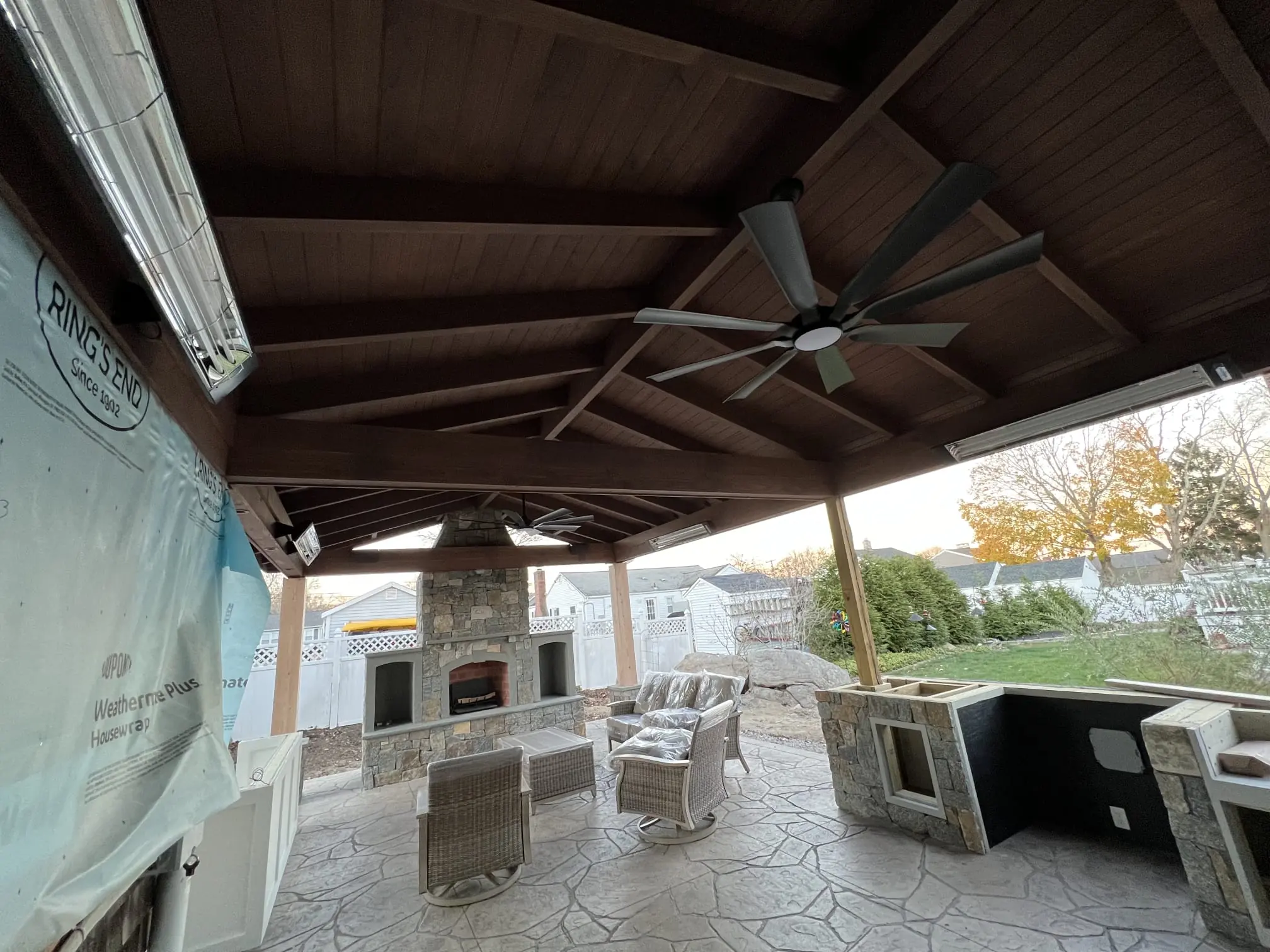 Tiered wood seating installation in progress.