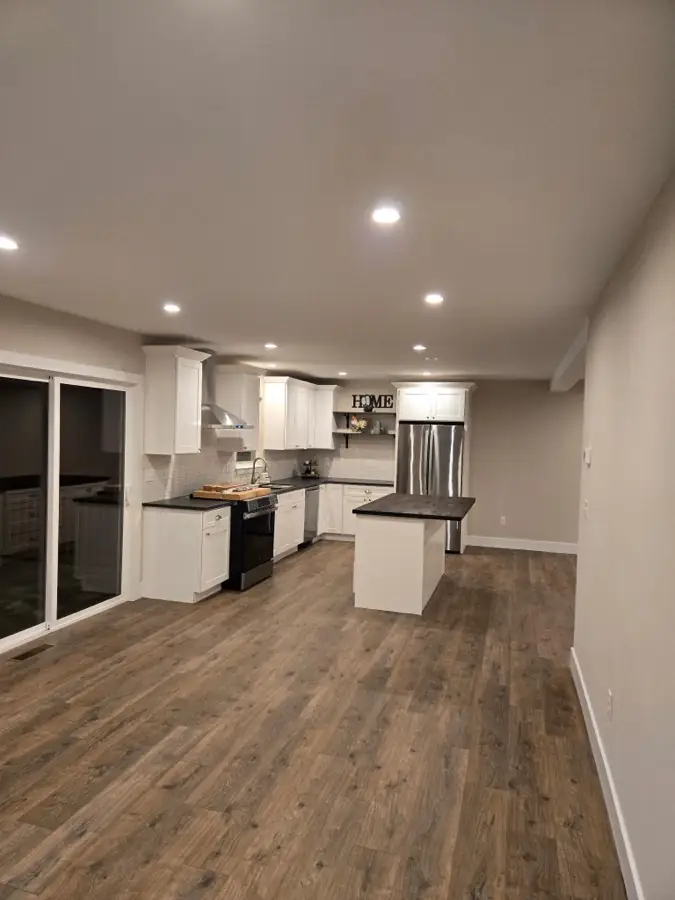 Open-concept interior finish project by Pandora Group LLC.